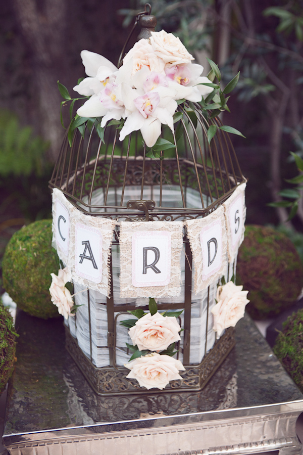 Vintage bird cage used as card holder for wedding | Photo by Duke Images